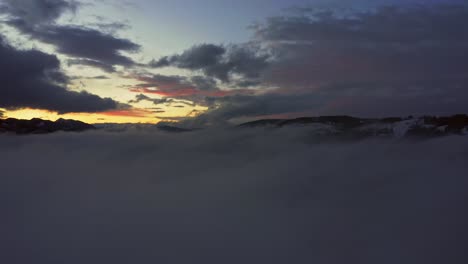 Drone-Flying-Over-Clouds-And-Fog-In-Zakopane-Near-Tatra-Mountains-At-Sunset-In-Poland