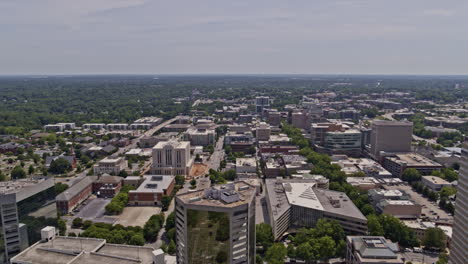 Greenville-South-Carolina-Aerial-v5-tracking-shot-flying-alongside-with-high-rise-buildings-capturing-low-rise-downtown-cityscape-in-daylight---Shot-with-Inspire-2,-X7-camera---May-2021