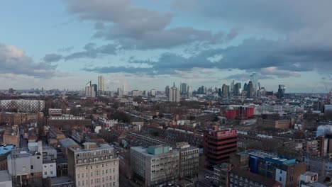Slider-drone-shot-of-London-skyscrapers-from-Camden