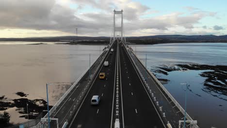 Drone-shot-following-along-the-Severn-Bridge-linking-England-with-Wales-near-to-Bristol,-UK