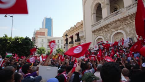 Thousands-Of-People-In-The-Street-Waving-Tunisian-Flag-During-Protest-In-Tunis-City,-Tunisia