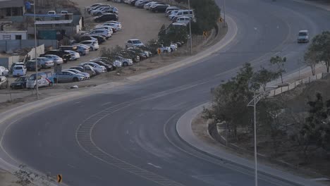 Curved-Road-With-Cars-Driving-Past-At-Bahria-Housing-Estate