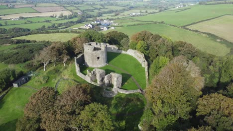 Aerial-view-of-Dundrum-Castle-on-a-sunny-day,-County-Down,-Northern-Ireland