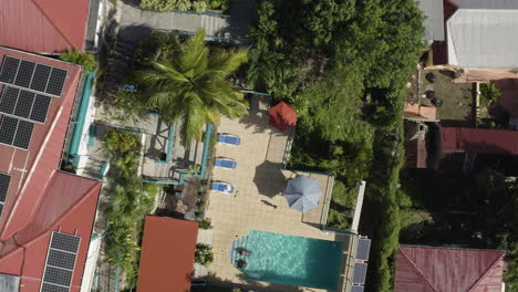 AERIAL---House-and-pool,-Charlotte-Amalie,-U