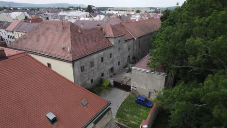 Drone-flight-over-the-renaissance-part-of-the-town-of-Moravská-Třebová,-around-old-buildings-and-a-park,-Czech-Republic
