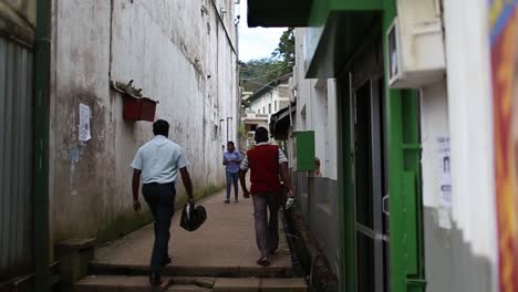 Indian-citizens-walk-in-a-narrow-alley-in-Chennai-city-at-daytime