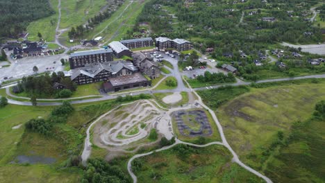 Vestlia-Resort-and-Hotel-high-altitude-aerial-overview-during-summer