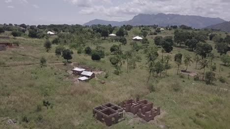 Aerial:-New-home-construction-in-rural-Malawi-hilltop-in-East-Africa
