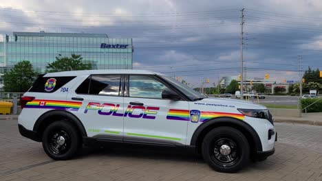 A-police-car-is-parked-outside-of-the-police-station-of-Peel-city,-Ontario,-Canada