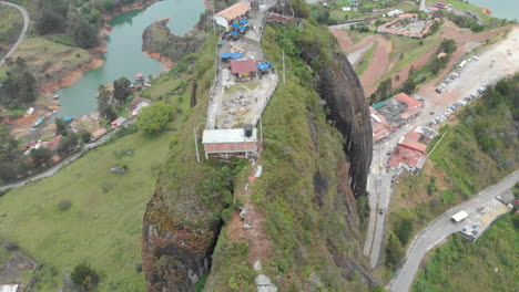 Top-View-Rock-of-Guatapé-in-Colombia---Colombian-landmark-and-natural-wonder---aerial-drone-shot