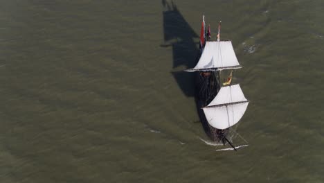An-aerial-footage-revolving-around-the-Halve-Maen-ship-at-the-middle-of-the-sea