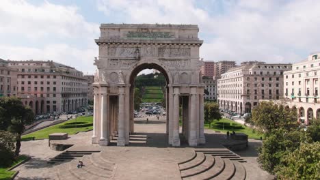 Victory-arch-of-Genoa-city,-cinematic-flying-towards-and-over-view