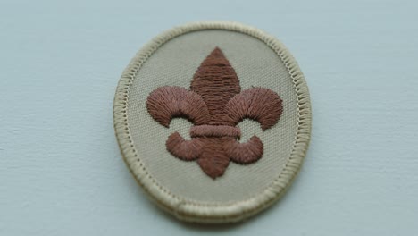 Close-Up-Tilt-Down-of-a-Boy-Scout-Arm-Patch