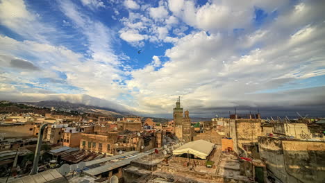 Aerial-beautiful-sunny-day-with-white-clouds-movment-in-timelapse-in-Jemaa-el-Fna-square-in-Morocco-at-daytime