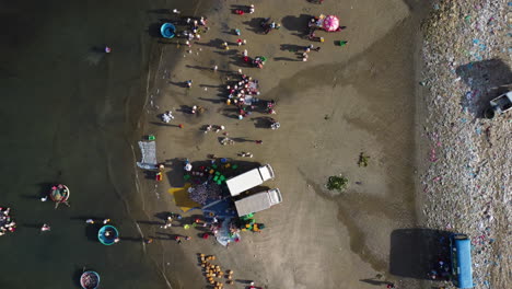 Aerial-View-Looking-Directly-Down-at-People-Fishing-at-Mui-Ne-Beach-in-Vietnam