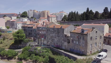 Aerial-shot-of-an-old-dilapidated-apartment-building-in-Lisbon,-Portugal