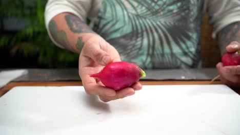 Chef-throw-radish-in-the-air-then-smashing-in-cutting-table-slow-motion