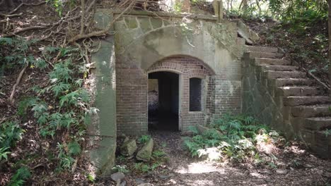 Underground-bunker-ruins-on-Tomogashima-Island,-Hidden-in-jungle,-Japan