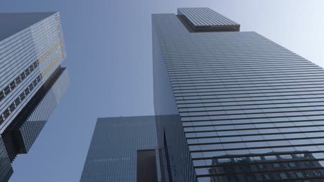 Samsung-Headquarters-HQ-glassy-skyscrapers-against-blue-sky,-Seoul-South-Korea---establishing-shot