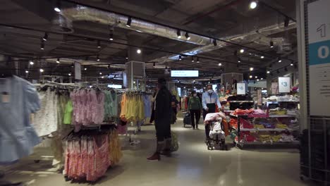 POV-Walking-Through-Primark-Fashion-Retail-Store-Past-Shoppers-In-Harrow-on-15-May-2022