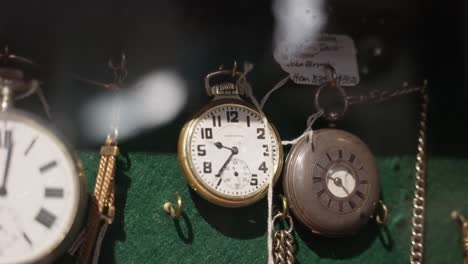 Multiple-stopwatches-hanging-in-antique-shop