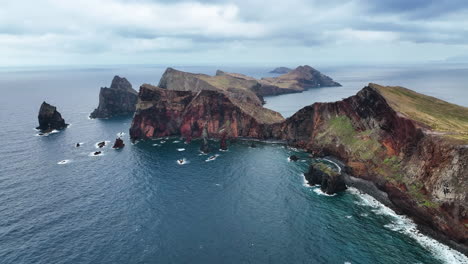 High-aerial-of-rugged-eastern-Madeira-headland,-Ponta-de-SÃ£o-LourenÃ§o