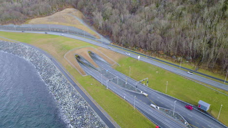 Traffic-Commuting-In-Ryfast-Subsea-Tunnel-Entrance-In-Norway,-Aerial