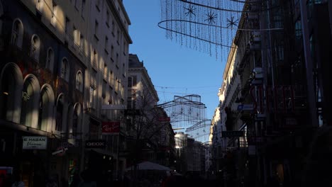 Silhouetted-view-of-Kärtnerstraße-in-Vienna,-Austria-with-clear-blue-sky