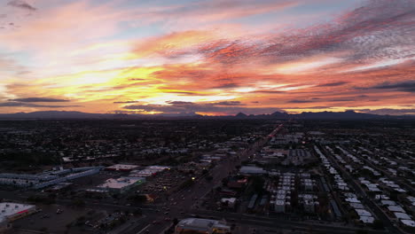 Cinematic-slowly-rotating-drone-sunsetting-shot-during-of-Tuscon-Arizona