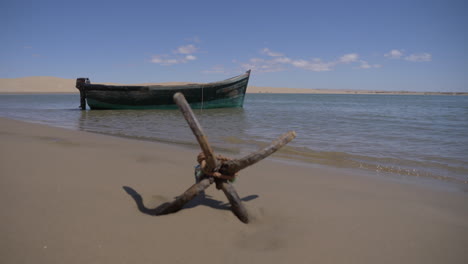 Small-ship-has-anchored-on-the-beach-in-the-sahara-desert