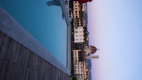 Swimming-Pool-Overlooking-Beautiful-City-of-Florence,-Italy-at-Sunset