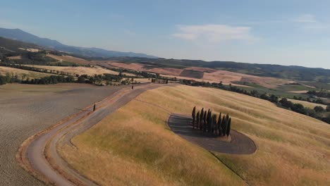 Aerial-shot-of-Natural-landscape-of-road-in-Val-d'orcia-,TUSCANY,ITALY