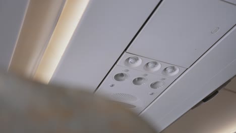 Close-up-to-air-conditioning-knob-on-an-airplane-during-the-flight