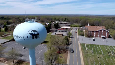 aerial-push-over-lewisville-nc,-north-carolina-water-tower