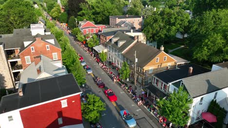 Family-and-friends-gather-to-watch-parade-in-small-town-USA
