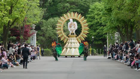 Dancers-and-a-float-at-the-Everland-Amusement-Park-parade-in-Yongin,-South-Korae