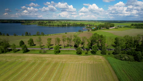 Scenic-Aerial-Shot-Of-Jezioro-Wielochowskie-Lake-With-Blue-Sky-in-Poland