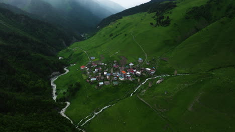 Aerial-View-Of-Adishi-Village-In-Svaneti-Region-On-A-Cloudy-Day-In-Georgia---drone-shot