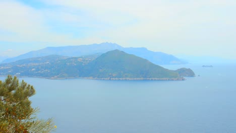 Pan-shot-of-Amalfi-Coast-in-distance-in-Sorento,-Italy-from-Capri-at-daytime