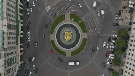 Slow-motion-dolly-out-aerial-shot-of-the-Freedom-Square-and-a-traffic