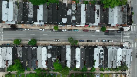 Top-down-aerial-of-rooftop-view-of-rowhomes-in-USA-city