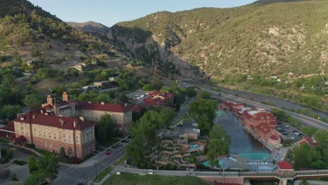 Aerial-approach-of-the-Hotel-Colorado-and-the-hot-Springs-pool-in-Glenwood-Springs