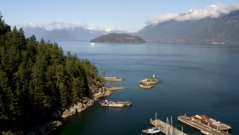 Boats-Dock-On-The-Marina-In-Howe-Sound-With-Bowyer-Island-In-The-Distance-From-Horseshoe-Bay-In-BC,-Canada