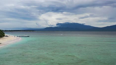 stormy-cloudy-day-around-tropical-waters-of-Gili-Trawangan-in-Indonesia,-aerial