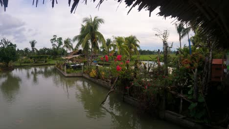 Small-Cottage-Accommodations-With-Tranquil-Pond-And-Garden-At-La-Caridad-Farm-In-Sogod,-Southern-Leyte