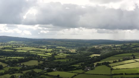 Sweeping-View-Of-Dartmoor-Fields-Over-Cloudscape-Sky-In-Devon-County,-Southwest-England