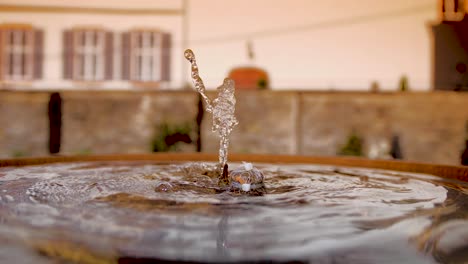 Detail-shot-of-a-waterspout-fountain-gush