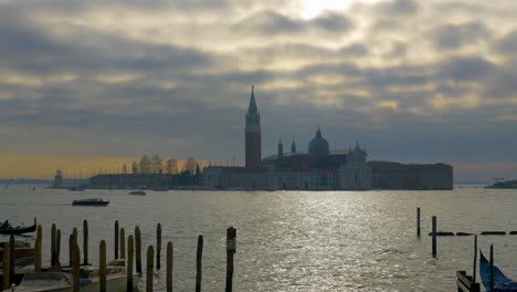 View-of-the-city-of-Venice-San-Giorgio-Maggiore-and-its-great-canal-on-a-partly-cloudy-day-at-sunset