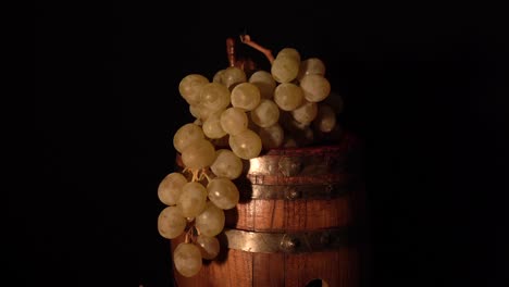 A-bit-closer-view-and-backward-rotating-wine-barrel-with-grape