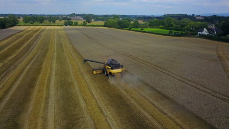 combine-harvester-working-in--field,-cheshire,england